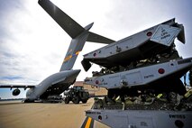U.S. Air Force Airmen assigned to the 20th Logistics Readiness Squadron load Aerospace Ground Equipment onto a C-17 Globemaster III in support of an upcoming deployment, Oct. 5, 2012, Shaw Air Force Base, S.C. Several Team Shaw Airmen and F-16 fighter pilots from the 77th Fighter Squadron deployed from Shaw to an undisclosed location in Southwest Asia. (U.S. Air Force photo by Staff Sgt. Kenny Holston/Released)