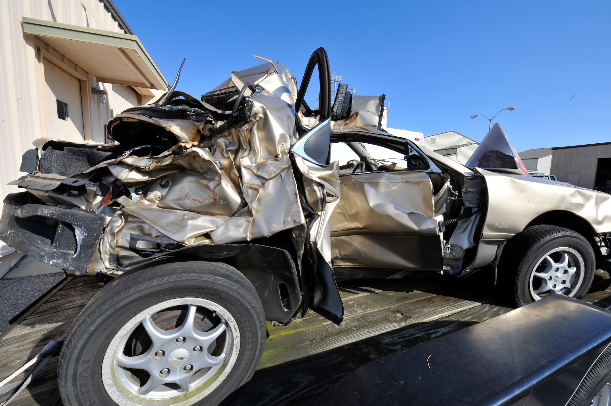 A badly-mangled vehicle sits in front of the Commando Hangar on Hurlburt field, Fla., Nov. 5, 2012. The vehicle was driven by Meagan Napier and Lisa Dickson, who were both killed when they were struck by a drunk driver on May 11, 2002.