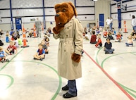 McGruff the Crime Dog, teaches the importance of reporting illegal activity to kindergartners at Randolph Elementary School, Oct. 25 at Joint Base San Antonio-Randolph. McGruff the Crime Dog is a cartoon bloodhound used by the National Crime Prevention Council to spread awareness of crime to children. (U.S. Air Force photo by Benjamin Faske)