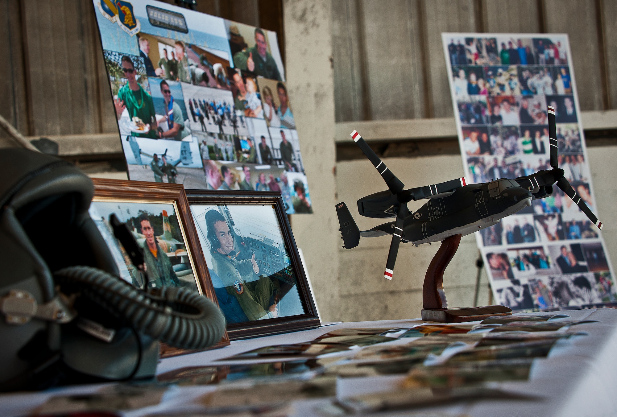 Photos and displays paying tribute to Maj. Garrett Knowlan’s career, family and life were on view at the memorial ceremony held for him, Nov. 5 at Eglin Air Force Base, Fla.  Knowlan died while participating in Air Force Survival, Evasion, Resistance and Escape training at the Naval Air Station in Pensacola.  The memorial service brought family, friends and co-workers together to say their final goodbyes.  (U.S. Air Force photo/Samuel King Jr.)