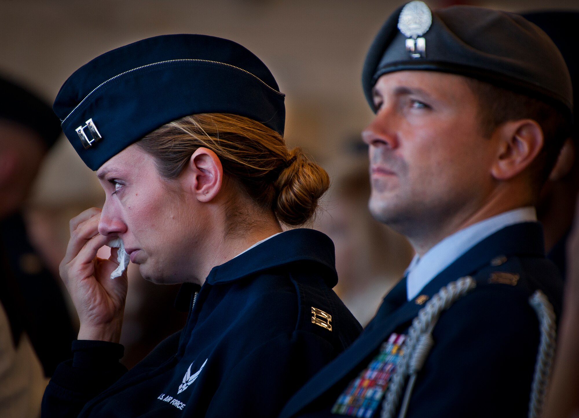 Captains Kristina and Jonathan Sawtelle attended the memorial ceremony for their friend, Maj. Garrett Knowlan, the 96th Test Wing executive officer, Nov. 5 at Eglin Air Force Base, Fla.  The Sawtelles were close to Knowlan through their church.  Knowlan died while participating in Air Force Survival, Evasion, Resistance and Escape training at the Naval Air Station in Pensacola.  The memorial service brought family, friends and co-workers together to say their final goodbyes.  (U.S. Air Force photo/Samuel King Jr.)