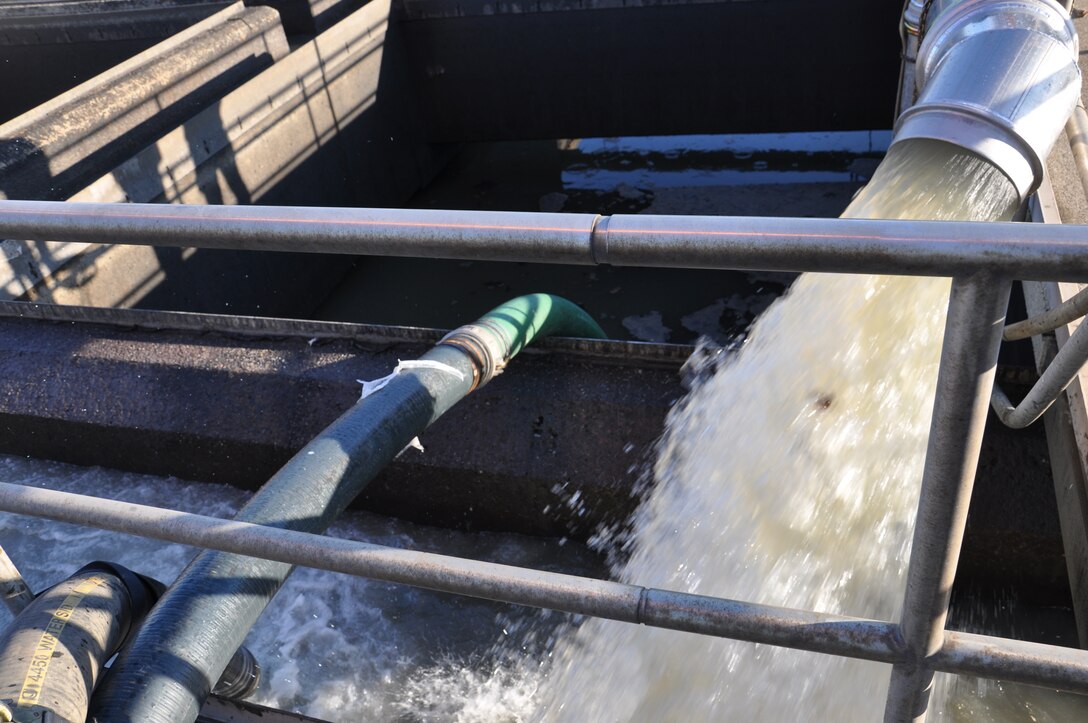 Water rushes through pipes and hoses set up by the 331st Air Expeditionary Group at the Rockaway wastewater treatment facility, Nov. 5, 2012. Approximately 50 Air Force civil engineers and 12 industrial pumps were sent from different locations around the country to form the 331st AEG, whose mission to help pump flood water from critical areas damaged by Hurricane Sandy. The 331st AEG are utilizing Joint Base McGuire-Dix-Lakehurst, N.J., facilities and equipment to assist their support operations.  (U.S. Air Force photo by Capt. Sybil Taunton/Released)