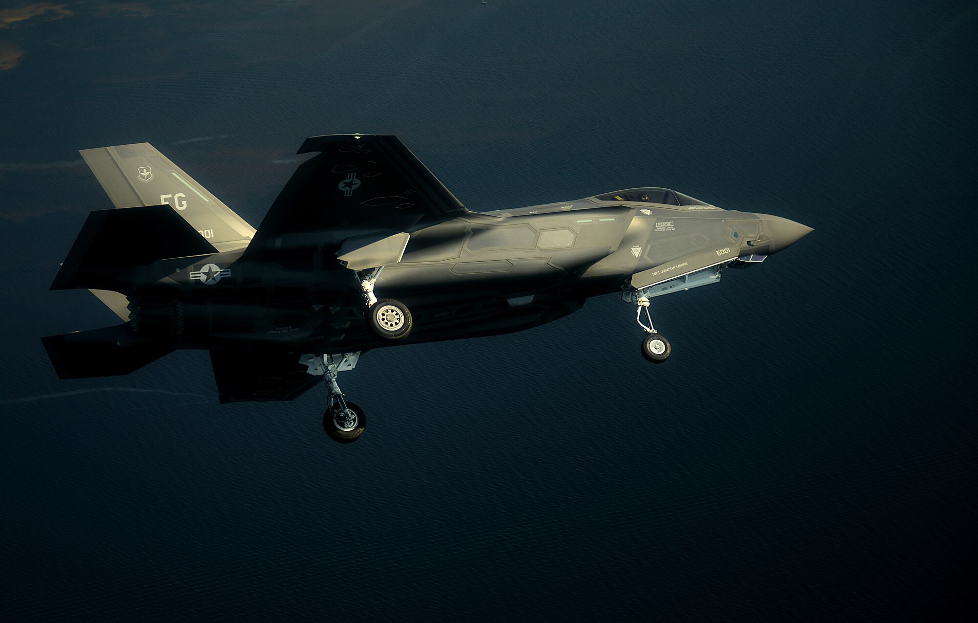 An F-35A Lightning II joint strike fighter from the 33rd Fighter Wing at Eglin Air Force Base, Fla., flies over the Emerald Coast Sept. 19, 2012 preparing to land.  (U.S. Air Force photo/Master Sgt. Jeremy T. Lock)