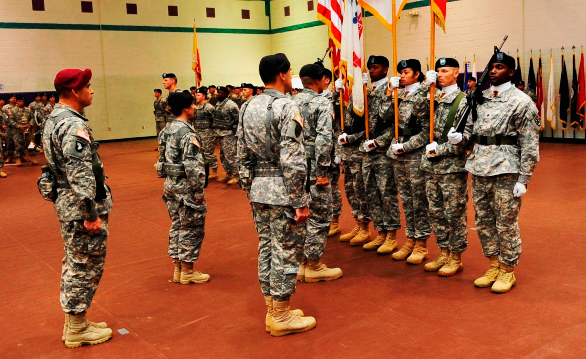 The 7th Sustainment Brigade, and subordinate units participate in a change-of-command ceremony for Col. Lawrence A. Kominiak and Col. Jennifer A. Reinkober, Nov.1, 2012, at McClellan Gym at Fort Eustis, Va. The reviewing official for the ceremony was Brig. Gen. Jeffrey N. Colt, 18th Airborne Corps deputy commanding general, and the commander of troops was Lt. Col. Douglas Pietrowski, 7th Sustainment Brigade deputy commander. (U.S. Air Force photo by Staff Sgt. Wesley Farnsworth/Released)