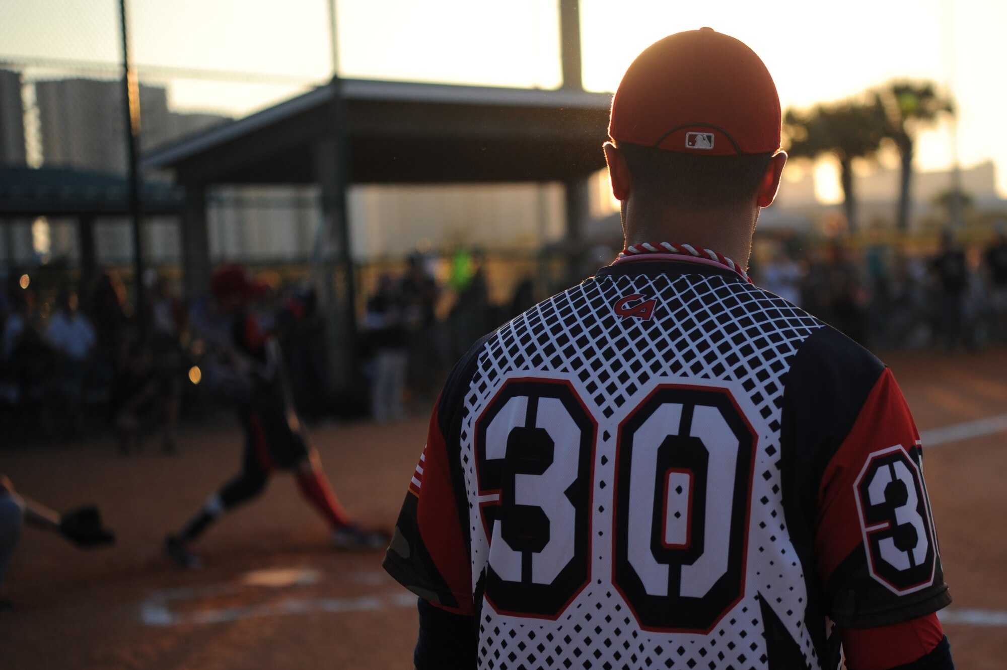 Saul Bosquez, Wounded Warrior Amputee softball team member, looks on as his team takes on the Northwest Florida Armed Services softball team at the Morgan Sports Complex in Destin, Fla., Nov. 3, 2012. The Wounded Warriors were defeated after 8 innings of play. (U.S. Air Force photo/Senior Airman Eboni Reams)
