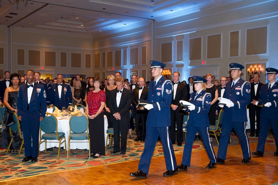 Members of the 45th Space Wing Honor Guard took part in the evening's
activities. More than 500 people attended the 65th Air Force Anniversary
Ball held Nov. 4 at the Radisson Resort at the Port in Cape Canaveral. This
year's theme was, "Say Thank You to an Airman-Honoring the Past, Innovating
the Future" and paid tribute to the Airman throughout our history who have
made our Air Force what it is today. At the far left is Chief Master Sgt.
Herman Moyer, 45th Space Command Chief.
