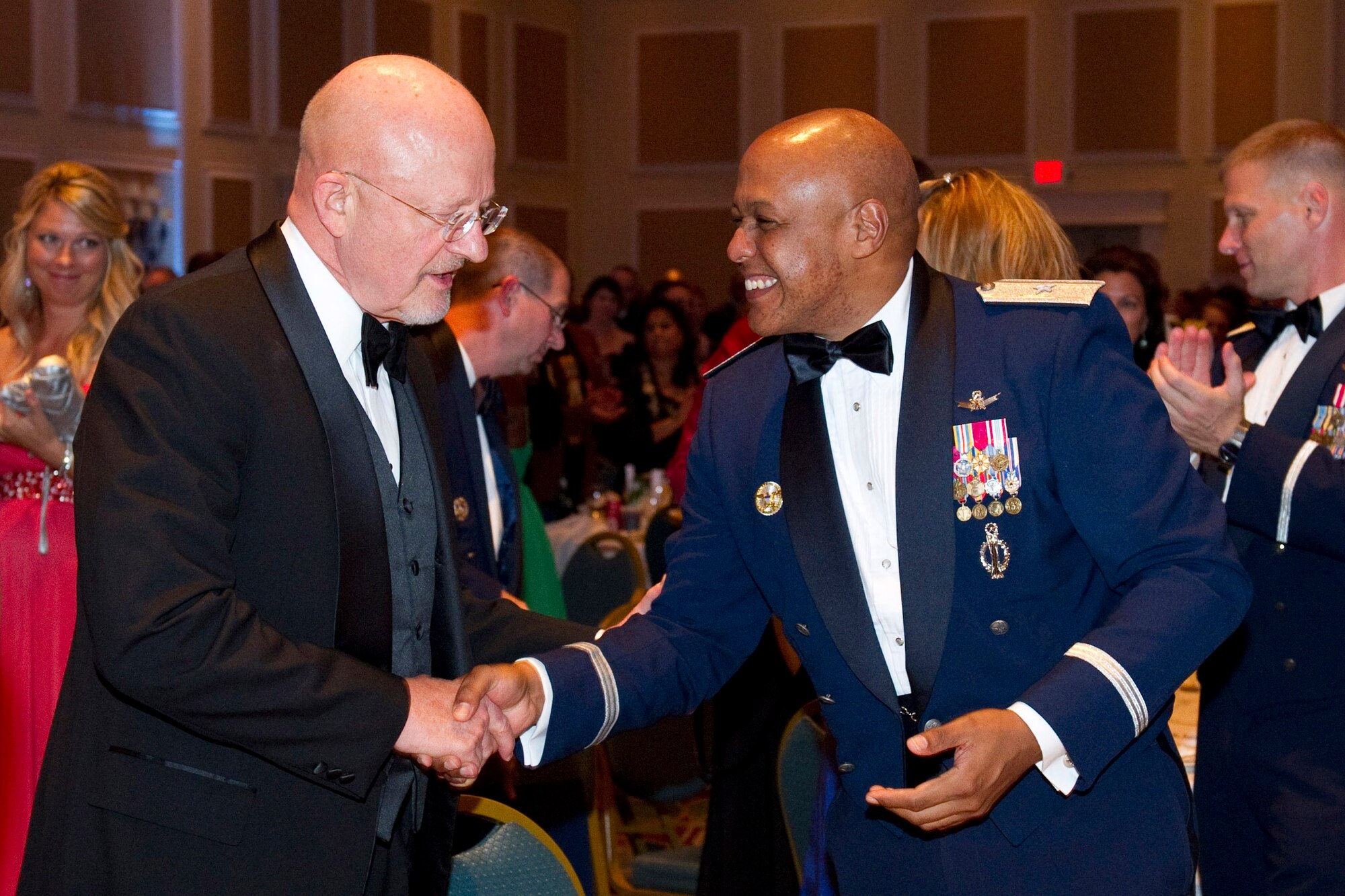 Brig. Gen. Anthony Cotton, commander, 45th Space Wing, thanks the Honorable
James R. Clapper, Jr. Director of National Intelligence, during the 65th
Anniversary of the Air Force Ball held Nov. 4 in Cape Canaveral. Director
Clapper, who served as the events guest speaker, is also a retired Air Force
Lieutenant General and a former commander of the Air Force Technical
Applications Center.
