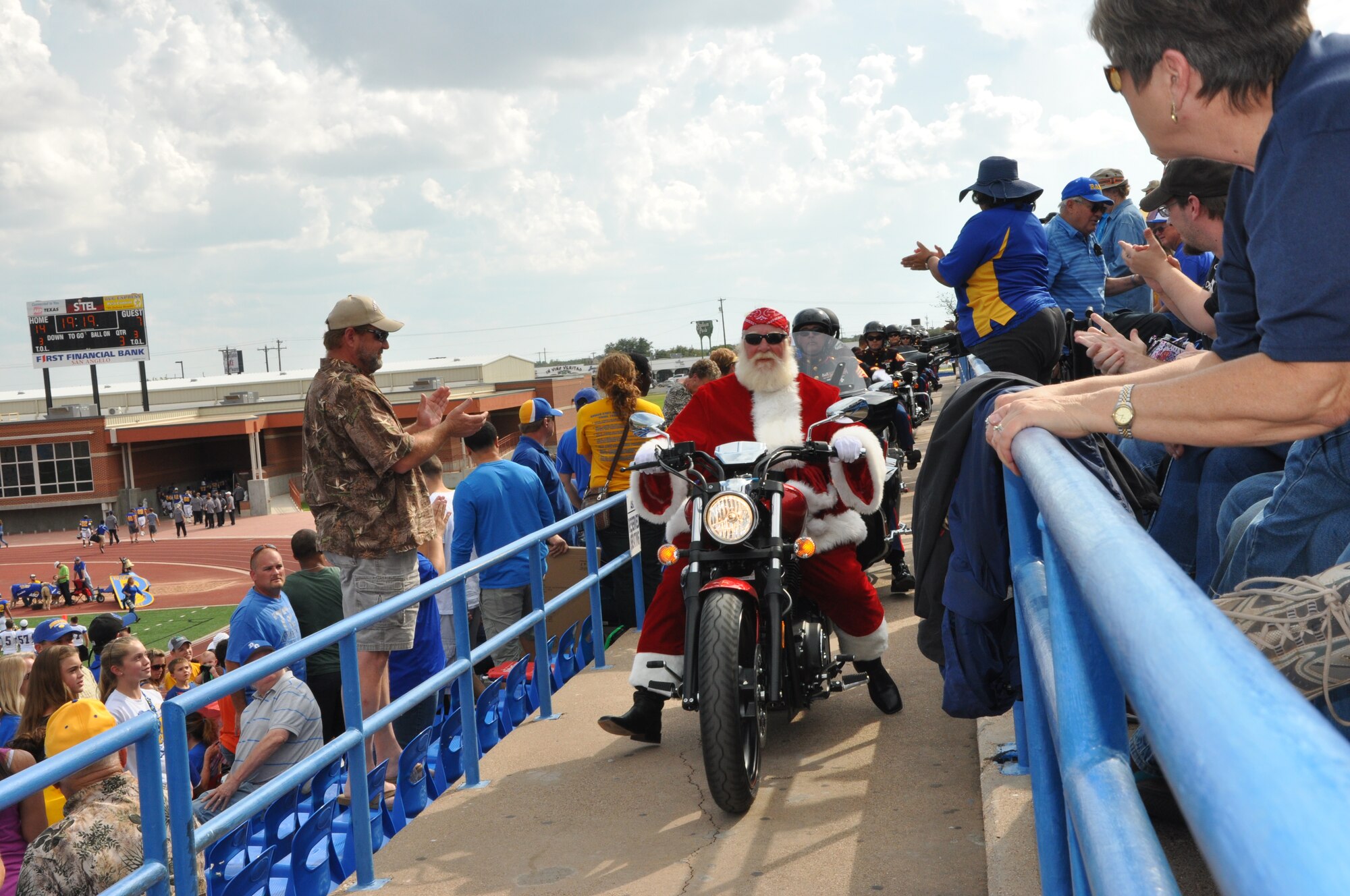 SAN ANGELO, Texas-  The Green Knights motorcycle club ride through the Angelo State football stadium in support of the ASU Military Appreciation Day Nov. 3 in San Angelo.  All military personnel and family were invited by ASU to attend, the Military Appreciation Day on ASU campus and at the football stadium. (U.S. Air Force photo/ Airman 1st Class Erica Rodriguez)