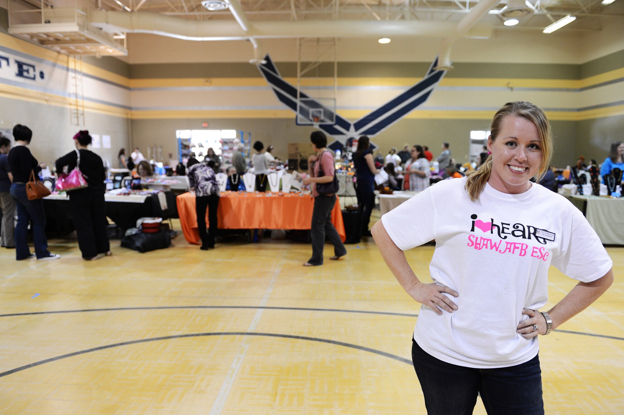 Ashley Klodt, Enlisted Spouses’ Club president, poses in the middle of the bazaar she and her fellow board members helped make a reality, Shaw Air Force Base, S.C., Nov. 3, 2012. “When you think bazaar, you think big, you think outrageous, you think fun. That’s exactly what we tried to bring to this event, and next year we hope to bring it even higher.” (U.S. Air Force photo by Airman 1st Class Daniel Blackwell/Released)