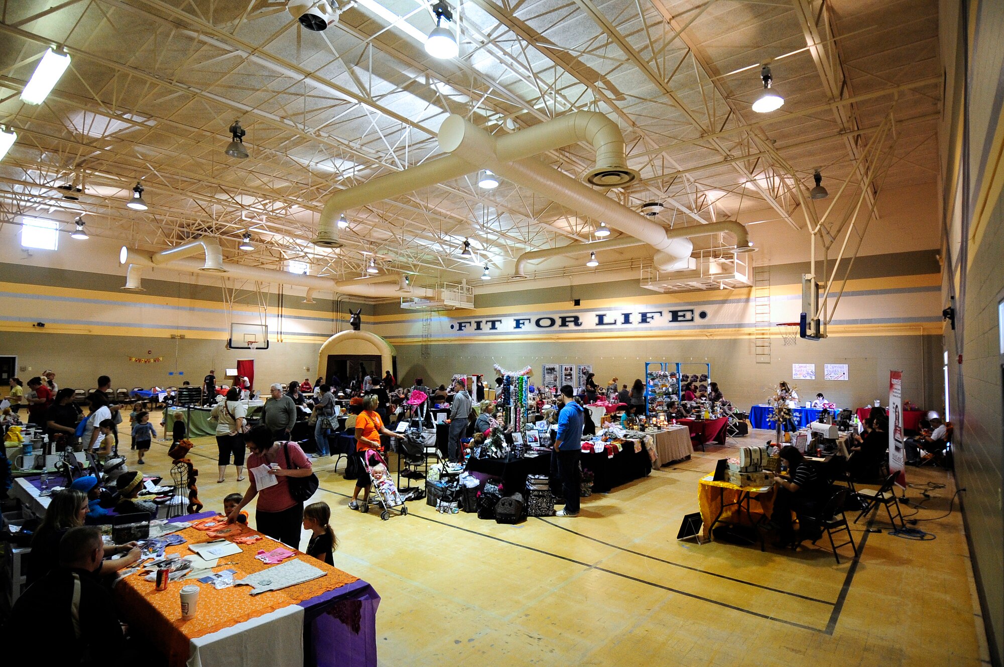 The Enlisted Spouses’ Club hosted Shaw’s first “Give Thanks Bazaar” in which ESC members were encouraged to set up booths to display their home businesses and homemade crafts at Shaw Air Force Base, S.C., Nov. 3, 2012. The bazaar took place in the fitness center’s old gym and was open from 9 a.m. to 3 p.m. (U.S. Air Force photo by Airman 1st Class Daniel Blackwell/Released)