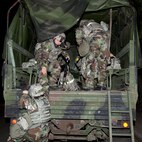 Airmen from the 8th Security Forces Squadron, load a truck during exercise Beverly Bulldog 13-1 on Kunsan Air Base, Republic of Korea, Nov. 7, 2012. The Airmen re-located operations after an attack forced them out of their current facility. (U.S. Air Force photo/Senior Airman Marcus Morris)
