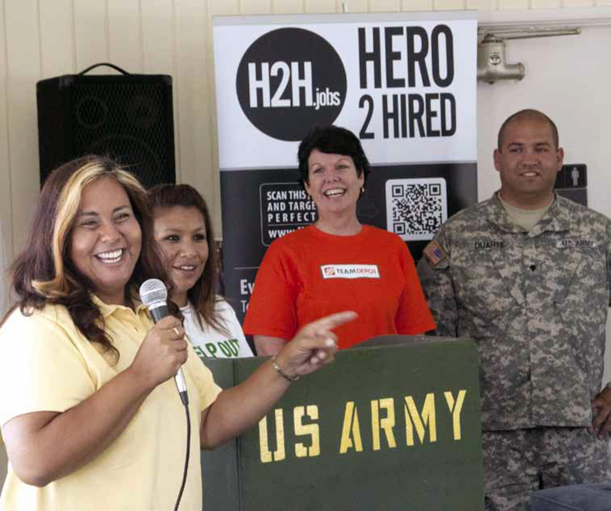 Rebecca Lambert, left, lead family readiness coordinator in Escondido, discusses
the many stories behind everyone coming together to renovate the building.
Home Depot’s Jo Anne Pagach, center, human resources and Spc. Jaime Duarte,
right, flooring manager as well as a mechanic in the 79th BSTB, volunteered to
renovate the new family readiness center. (Air National Guard photo by Master Sgt. Julie Avey)