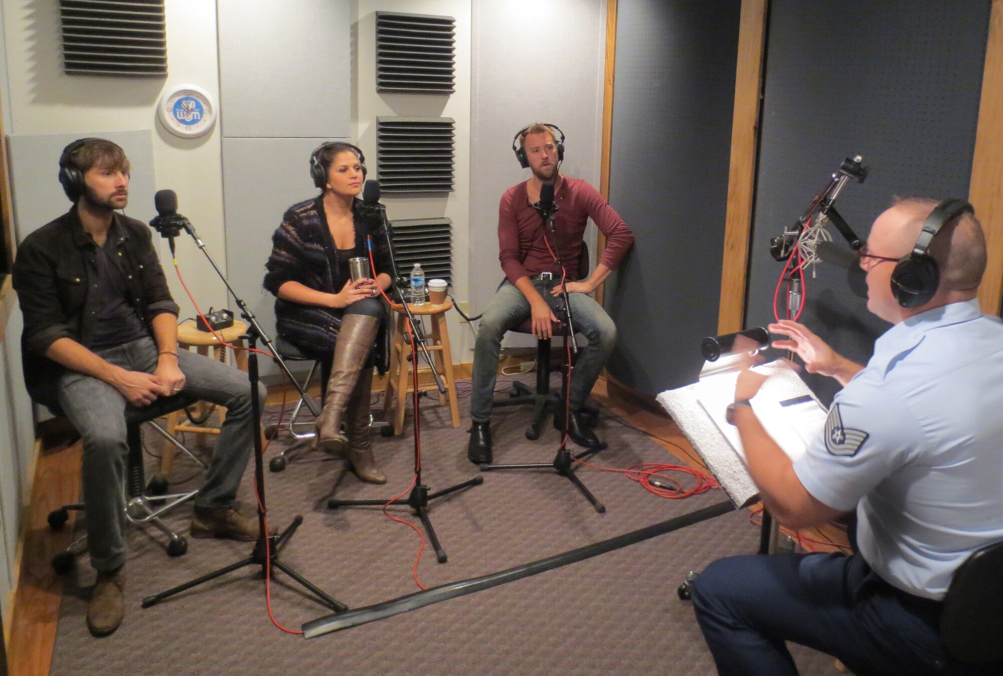 Air Force Tech. Sgt. Harry Kibbe interviews Lady Antebellum for the 2012 “Red, White and Air Force Blue Christmas” radio special. The one-hour program, recorded at Spotland Productions in Nashville, will be sent to more than 3,300 country radio stations in the United States and the Armed Forces Network for airing during the upcoming holiday season. (U.S. Air Force photo/Dale Eckroth)