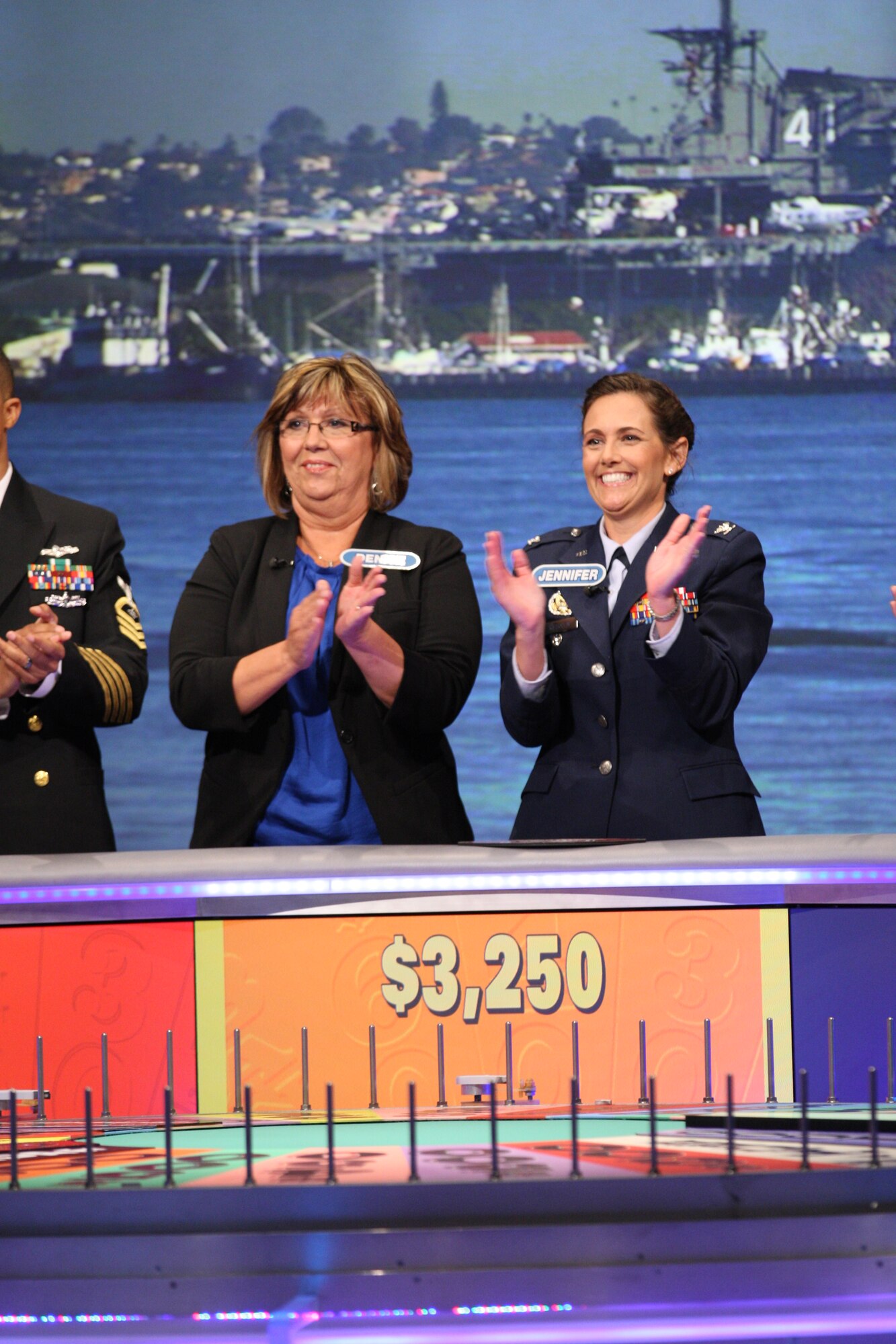 U.S.Air Force Col. Jennifer Kilbourn, Headquarters ACC Resources Division Deputy Chief, and her mother Denise Vandermark film a special edition of Wheel of Fortune honoring military families in Los Angeles, Oct. 17. Wheel of Fortune's military families week airs Nov. 12-16, with Kilbourn’s kicking off the celebration Nov. 9. (Courtesy photo)