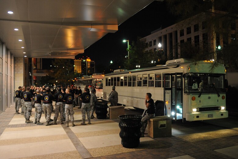 Buses from the 2nd Logistics Readiness Squadron Vehicle Operations Flight wait outside the Shreveport Convention Center during the 2012 Air Force Global Strike Challenge Symposium in Shreveport, La., Nov. 5. Vehicle operators supported the 2012 GSC by transporting Airmen to specific locations including their lodging, the symposium and Hoban Hall for the score posting. (U.S. Air Force photo/Airman 1st Class Benjamin Gonsier)(RELEASED) 