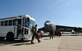 Aircrew members exit a bus operated by Staff Sgt. Anthony Jones Jr., 2nd Logistics Readiness Squadron Vehicle Operations craftsman, on Barksdale Air Force Base, La., Nov. 6. Vehicle operators support the Barksdale mission by driving aircrew to and from their aircraft as well as perform several other vital tasks. (U.S. Air Force photo/Airman 1st Class Benjamin Gonsier)(RELEASED)
