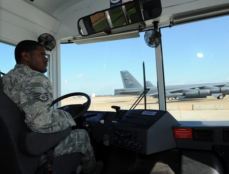 Staff Sgt. Anthony Jones Jr., 2nd Logistics Readiness Squadron Vehicle Operations craftsman, drives a bus on the flightline on Barksdale Air Force Base, La., Nov. 6. Vehicle operators drive high-ranking individuals from the Air Force and its sister services, as well as foreign dignitaries and groups touring the base. (U.S. Air Force photo/Airman 1st Class Benjamin Gonsier)(RELEASED)