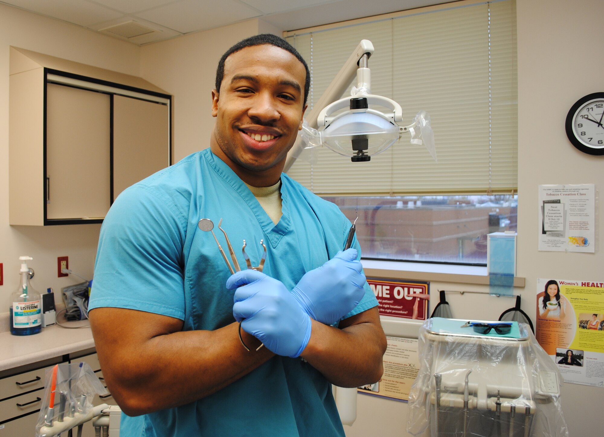 Airman 1st Class Robin Reese from the 319th Medical Operations Squadron is happy to show his pearly whites for a photo Nov. 6, 2012, on Grand Forks Air Force Base, N.D. Reese, a native from Columbus, Ga., attended a 48-day long course of technical training at Ft. Sam Houston, Texas, in order to become a dental assistant. (U.S. Air Force photo/Senior Airman Luis Loza Gutierrez)