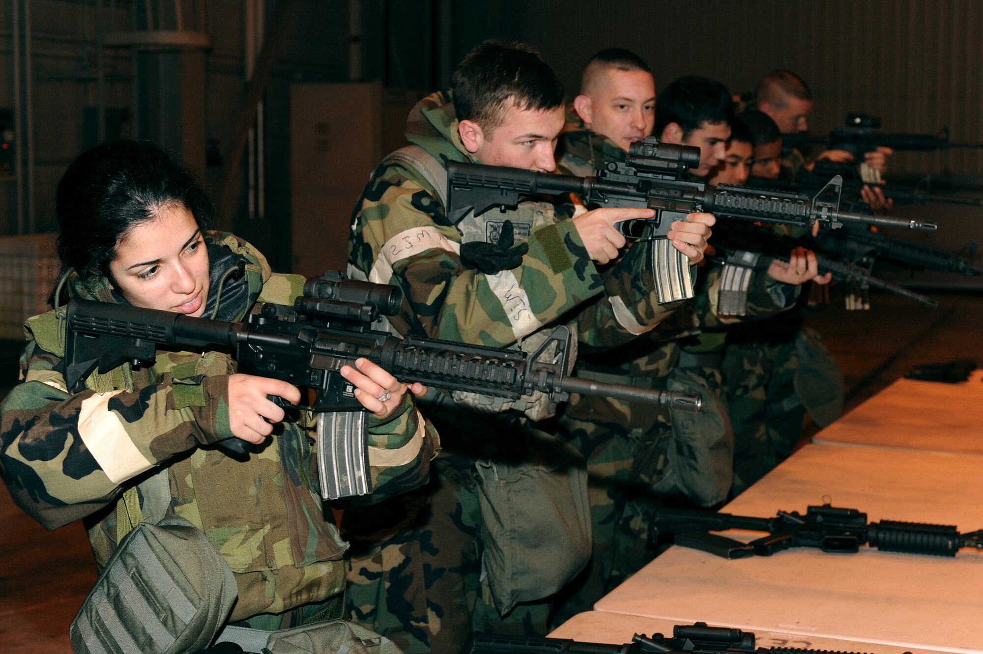 Icemen assigned to the 354th Fighter Wing perform M-4 carbine familiarization training during an operational readiness exercise Nov. 6, 2012, Eielson Air Force Base, Alaska.  Exercise evaluation teams help train Airmen the most up-to-date weapon systems for future deployments to hazardous regions. (U.S. Air Force photo/Staff Sgt. Jim Araos)