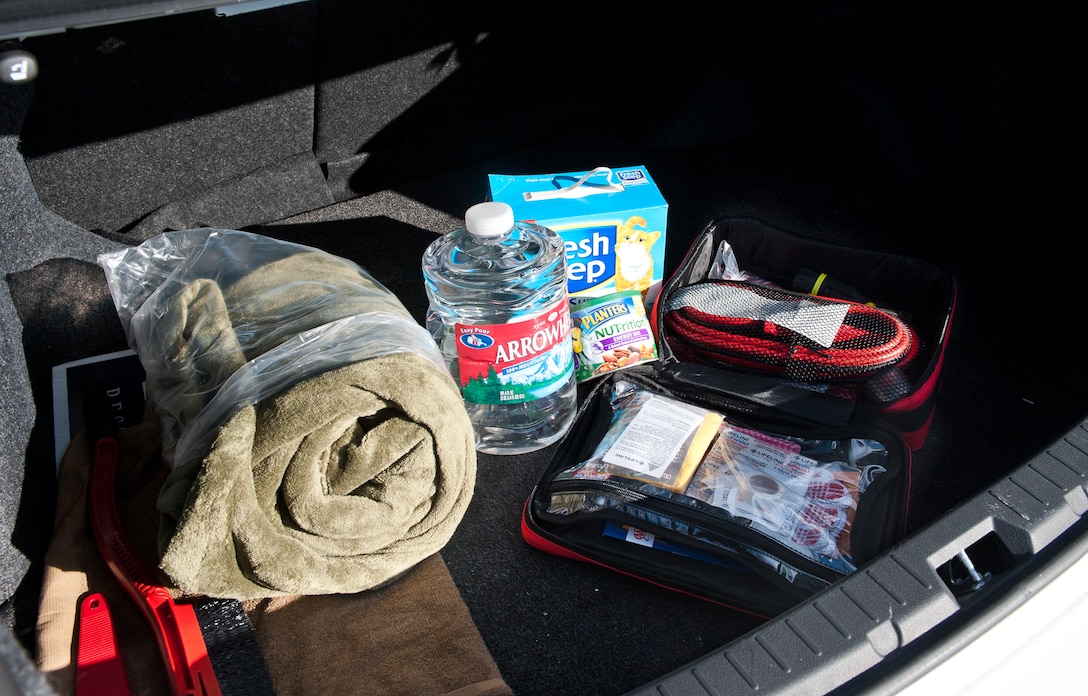 A winter driving safety kit is spread out to show the essential items at Ellsworth Air Force Base, S.D., Oct. 31, 2012. In the event of an emergency situation, a winter driving safety kit can mean the difference of life or death. Items of a survival kit can vary, but all should include water, blankets, jumper cables, ice scraper, basic tools, cat litter for tire traction, a shovel, a first aid kit, and non-perishable food items. For more information on how to build a safety kit, call the 28th Bomb Wing ground safety office at (605) 385-4771. (U.S. Air Force photo by Airman 1st Class Alystria Maurer/Released)