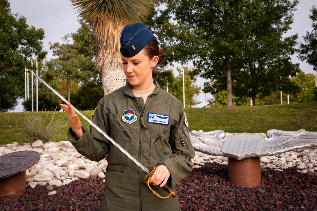 2nd Lt. Keely Yankie, a member of Class 13-01, displays her great-great-grandfather, Joseph Yankie’s, infantry saber at Laughlin Air Force Base, Texas, Oct. 31, 2012. Yankie received the sword from her family at her Specialized Undergraduate Pilot Training graduation Oct. 26, 2012, to celebrate her becoming a pilot. (U.S. Air Force photo/Airman 1st Class Nathan Maysonet)