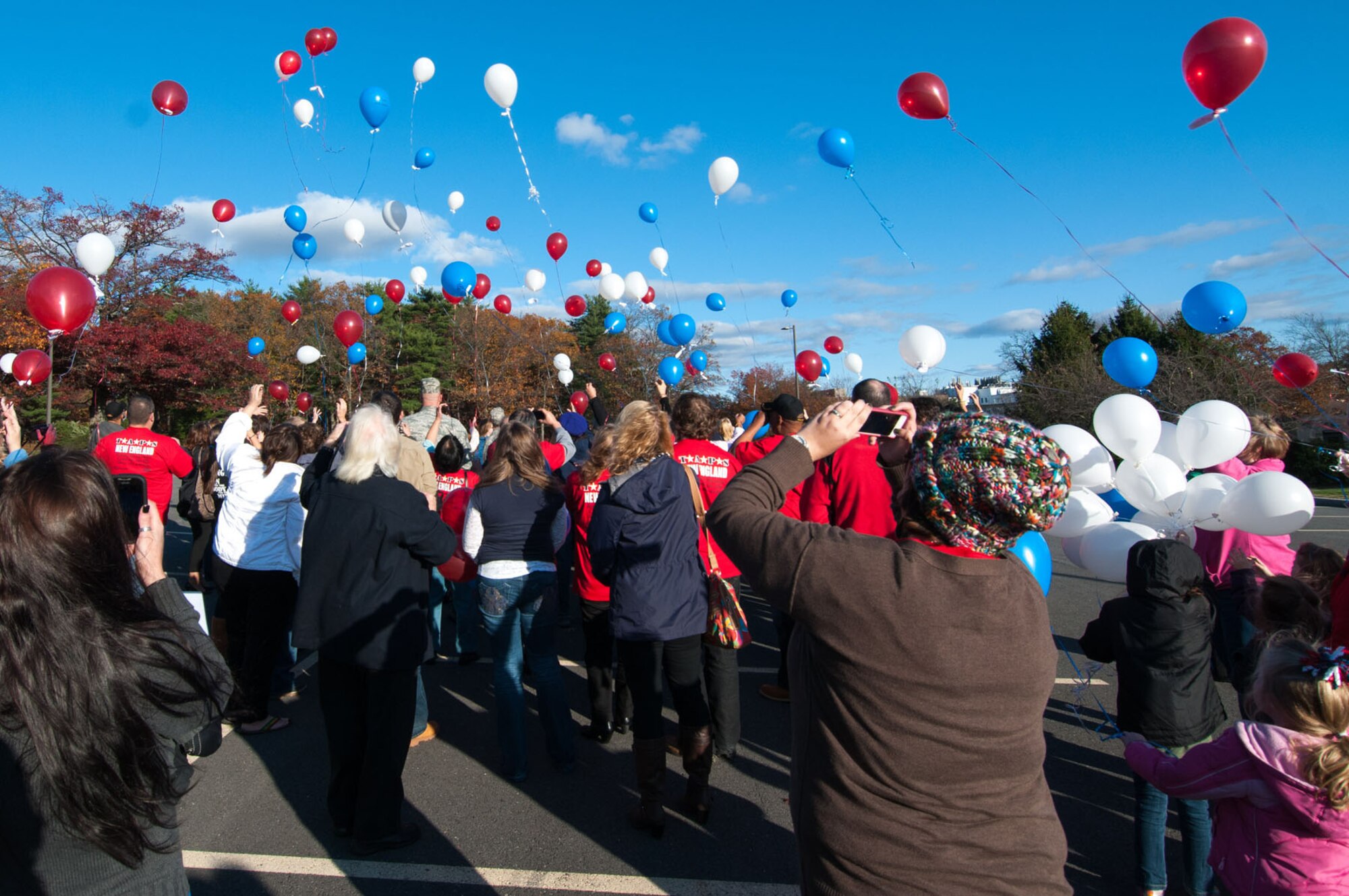 HANSCOM AIR FORCE BASE, Mass. – Attendees of the Transition Assistance Programs for Survivors Military Survivor Seminar and Good Grief Camp release balloons with notes attached to their loved ones outside the Minuteman Commons Nov. 3. TAPS is open to surviving family members of military personnel who have died while serving in the military. (U.S. Air Force photo by Rick Berry)