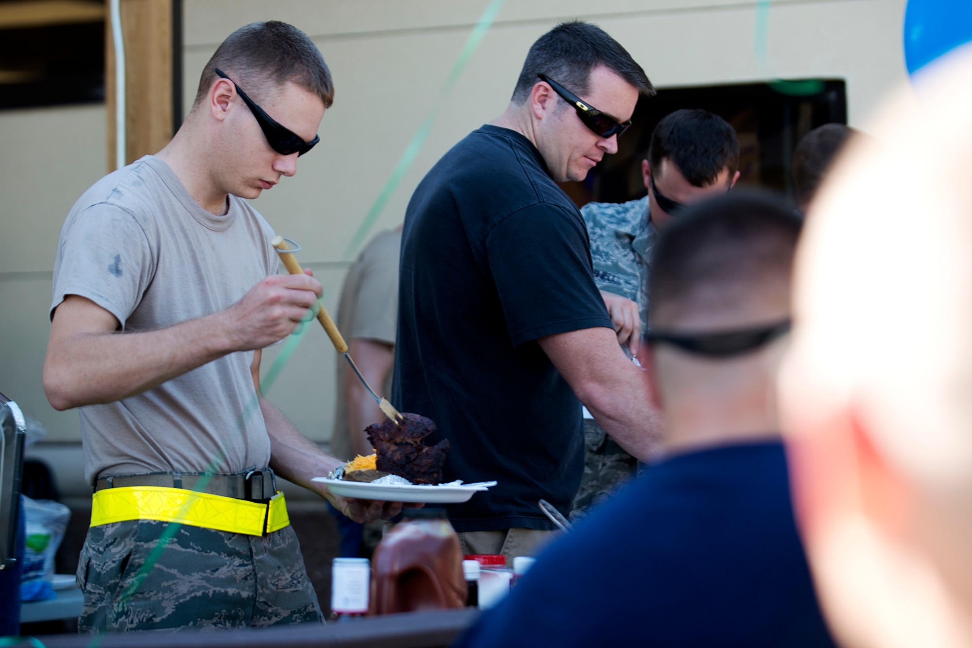 307th Aircraft Maintenance Squadron personnel are treated to a steak lunch by the 93rd Bomb Squadron, Nov. 2, 2012, Barksdale Air Force Base, La. The maintainers maintain the B-52H Stratofortresses flown by the 93 BS. (U.S. Air Force photo by Master Sgt. Greg Steele/Released)
