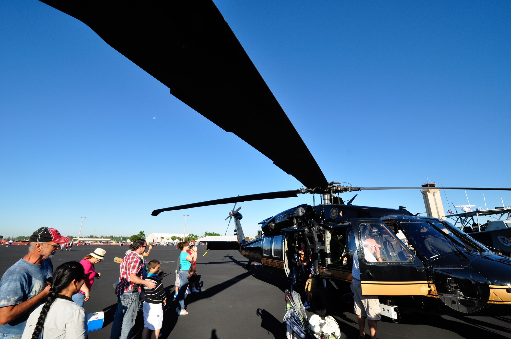 Spectators check out the U.S. Customs and Border Protection Blackhawk helicopter during the Wings Over Homestead air show at Homestead Air Reserve Base, Fla., Nov. 3. (U.S. Air Force photo/Tech. Sgt. Robert Gibson) 