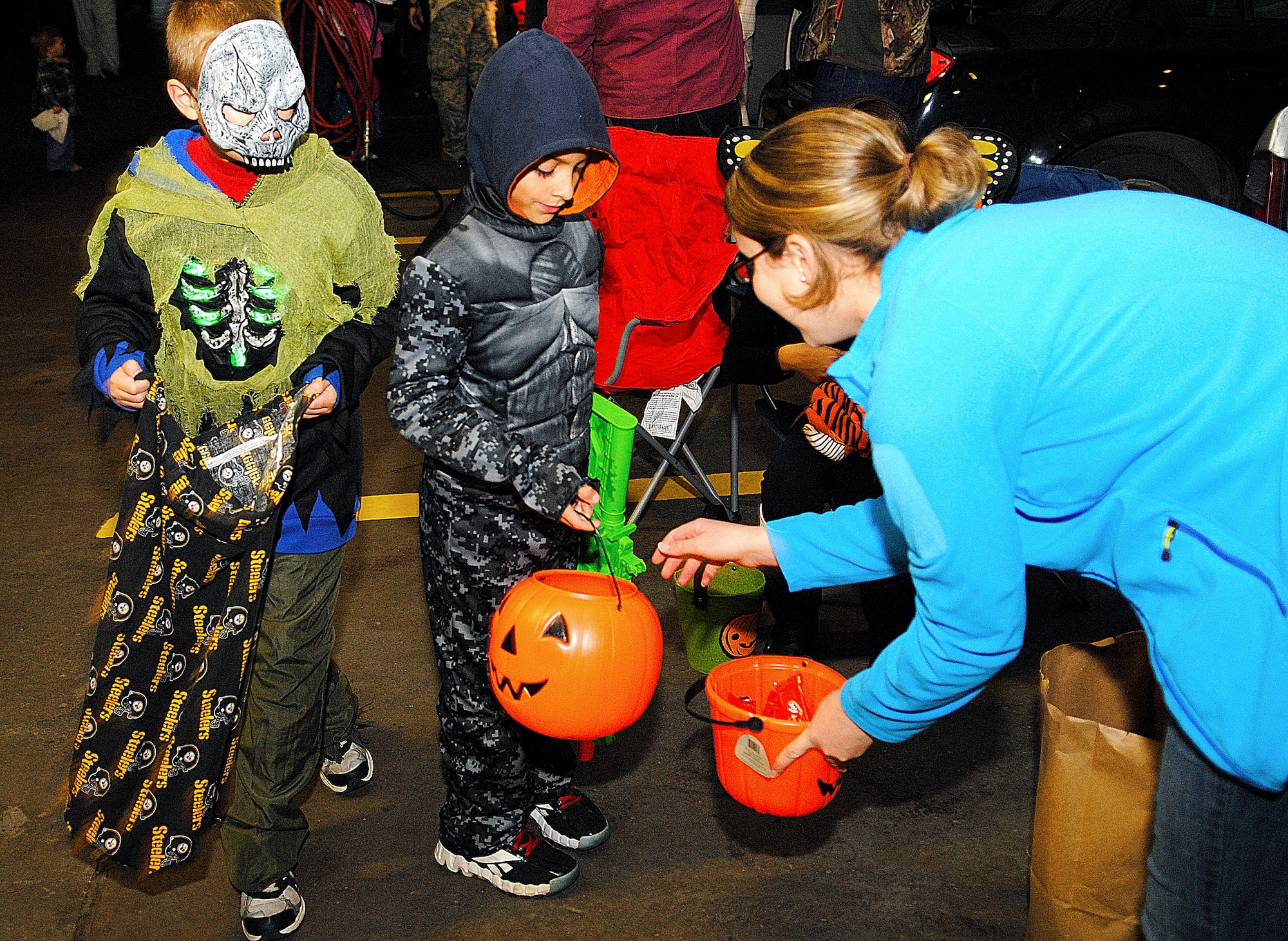 MINOT AIR FORCE BASE, N.D. -- Children and their parents had the opportunity to enjoy a warm and comfortable Halloween at the 5th Logistics Readiness Squadron's ‘Trunk-or-Treat’ event here, Oct. 31.The Airmen who handed out candy at the event decorated their vehicles with a diverse range of Halloween-type ornamentations. (U.S. Air Force photo/2nd Lt. Jose R. Davis) 