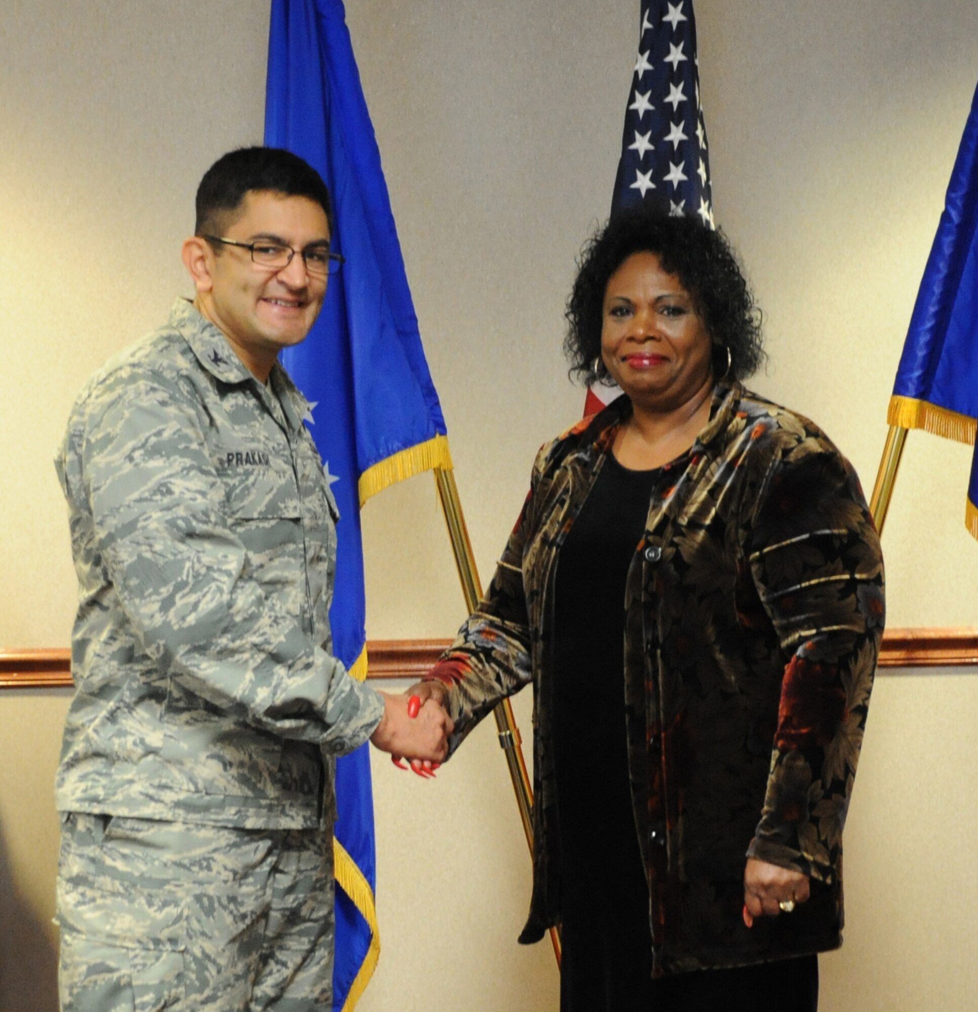 Col Om Prakash (left), 82nd Training Wing Vice Commander, congratulates Ms. Brenda Mackey (MSgt ret.), 82nd Aerospace Medicine Squadron, on her selection as the "Commander's Wingman of Choice" for Nov. 5-9. Mackey was recognized during the wing staff meeting Nov. 7. (U.S. Air Force photo/Kimberly Parker)