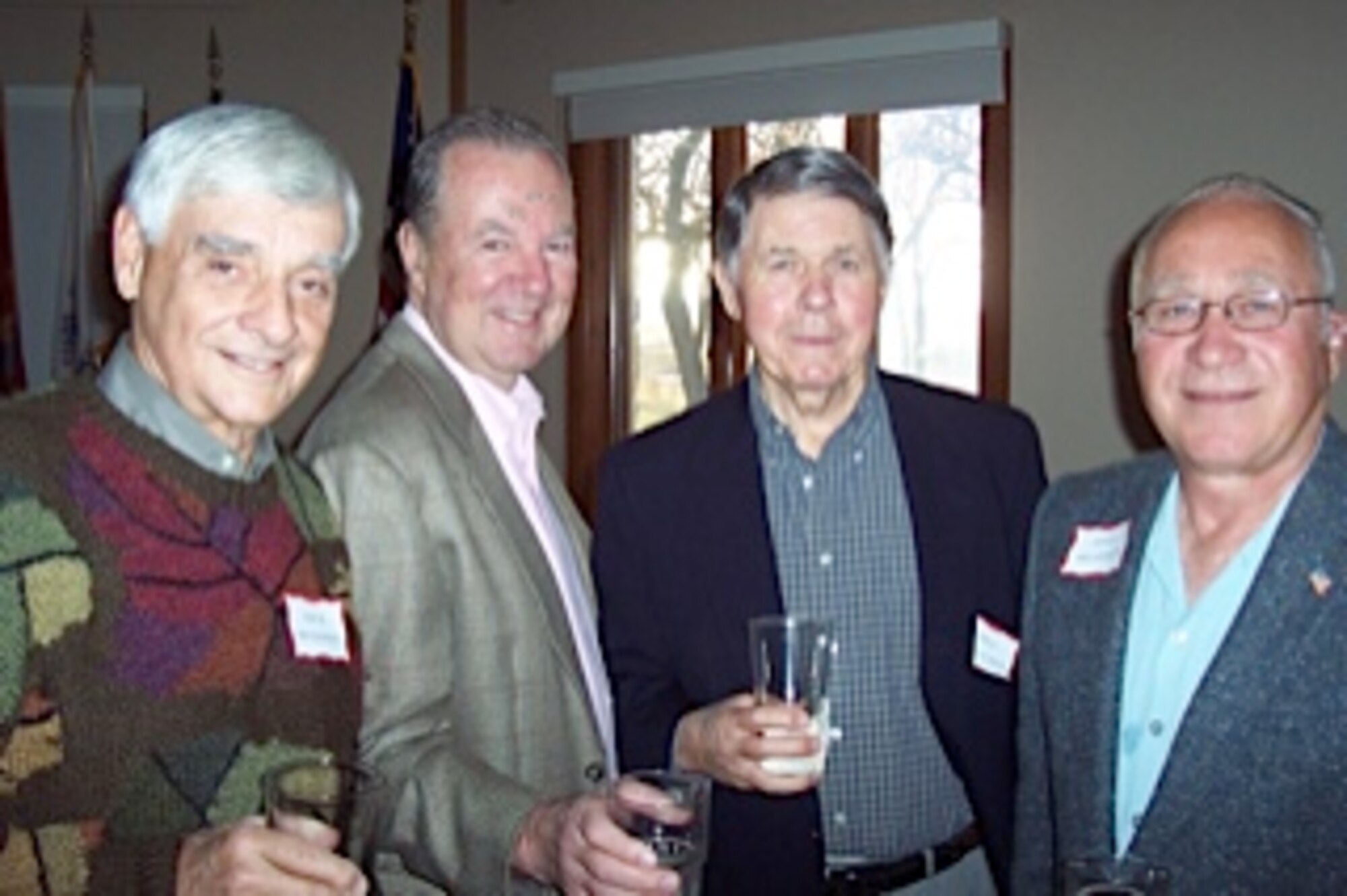 From left, former 96th Airlift Squadron Commanders Dick Severson, Dennis Kearns and Bill Ferguson with John Skarhus at the 96th Associate Squadron reunion Oct. 20. (Courtesy Photo)