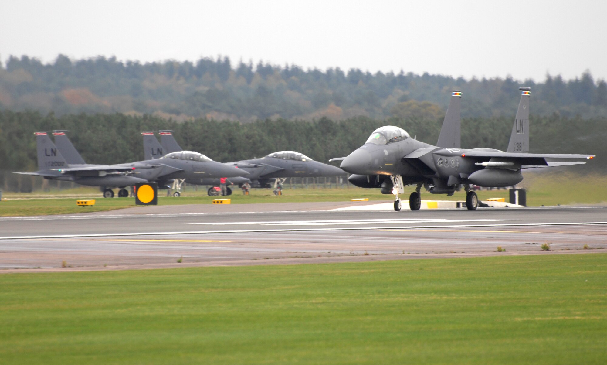 ROYAL AIR FORCE LAKENHEATH, England - An F-15E Strike Eagle takes off to support an exercise involving joint terminal air controllers Nov. 6, 2012. The Strike Eagle has the capability to fight its way to a target over long ranges, destroy enemy ground positions and fight its way out. (U.S. Air Force photo by Airman 1st Class Dana Butler)