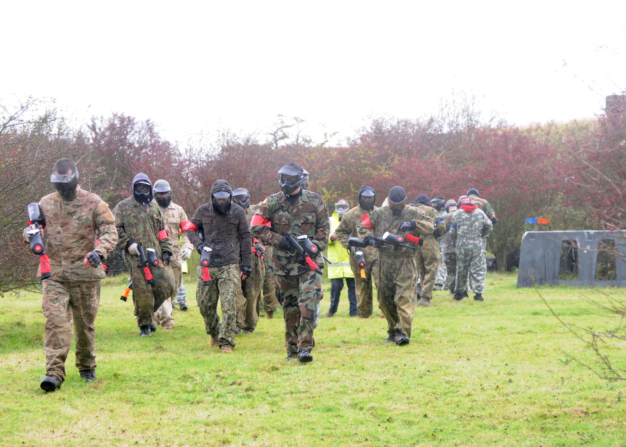 RAF MOLESWORTH, United Kingdom - Service members from RAF Alconbury,  RAF Molesworth, RAF Mildenhall and RAF Lakenheath prepare for the Multi-Base Paintball Challenge Nov. 3, 2012, at RAF Molesworth, United Kingdom. The service members were split into three teams and played on two different courses. The day ended in an all-out free for all. (U.S. Air Force photo by Airman 1st Class Kelsey Waters)