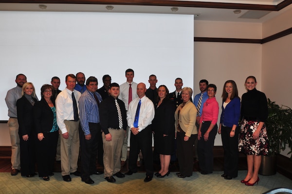 Nashville District EAGLE Class stands for a group picture during the Nashville District's 2012 EAGLE Class graduation held on Thursday, Nov. 1, 2012 at the Jack C. Massey Business Center at Belmont University. (Front row left to right) Amanda RutherFord, accountant; Janet Smith, secretary for the commander; Charles Leath, environmental protection specialist; Christopher Vega, contract inspector; Dustin Russell, electrical engineer, Christopher Meeks, senior electrician; Lori Neubert, administrative assistant; Natalie Haley, accountant; Jane Harris, engineering technician; Ramune Morales, project planning manager; Kara Beverly, regulatory specialist;(Back row, left to right) Jeff Fallin, maintenance engineer, Brent Sewell, natural resource specialist; Paul Drinkard, electrician; Arnette Hardage, accountant; Christopher Stoltz, environmental engineer; Terrance Farrow, mechanic trainee; Maj. Patrick Dagon, deputy commander for the Nashville District; and Tyler Matthews, natural resource specialist. (USACE photo by Amy Redmond)