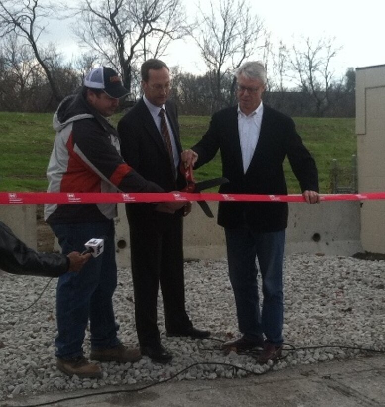 The ribbon is cut on Central Place Levee in Des Moines, Iowa.