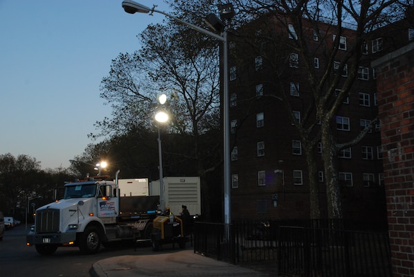 Residents in the Redfern Housing Complex in Far Rockaway, N.Y. had been without power since Hurricane Sandy devastated the northeast a week prior. But because of a joint effort by the U.S. Army Corps of Engineers, other branch components and federal and state partners working through the Federal Emergency Management Agency (FEMA), power is continuing to be restored in Rockaway and other hard-hit areas throughout New York and New Jersey.