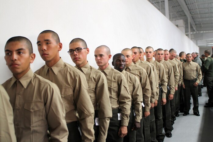 Recruits of Company L, 3rd Recruit Training Battalion, wait in line to have their uniforms inspected for any tailoring necessary aboard Marine Corps Recruit Depot San Diego, Oct. 31. Recruits recieved all their Marine dress uniforms. 