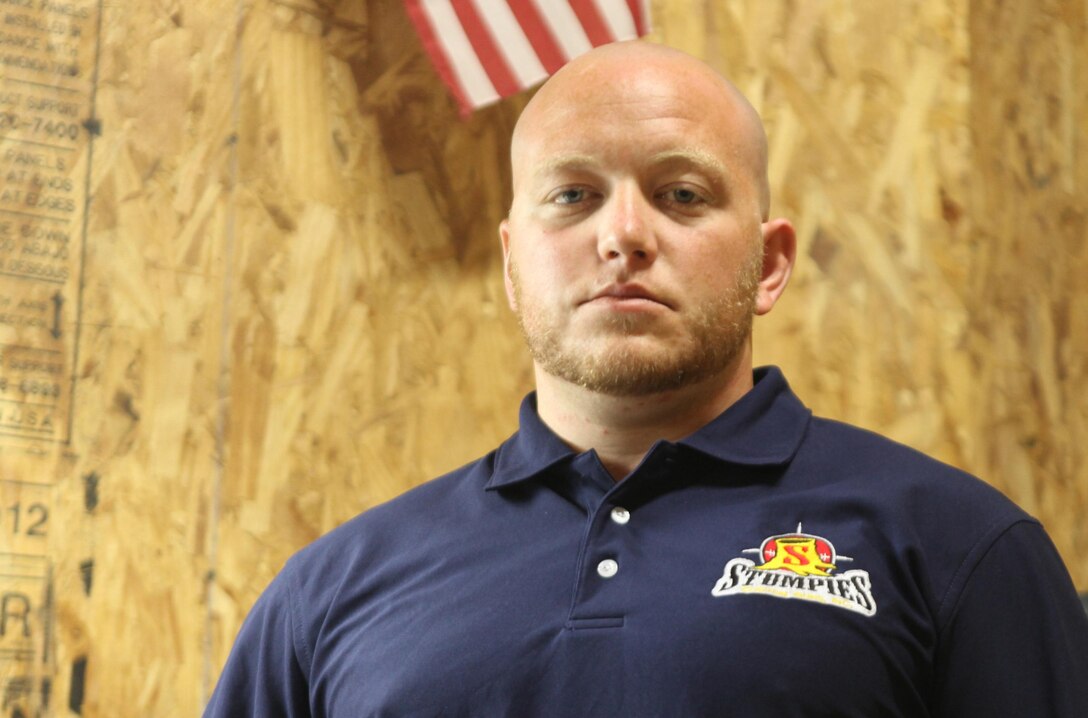 Retired Staff Sgt. Brad M. Lang, who was a technician with 2nd Explosive Ordnance Disposal Company, 2nd Marine Logistics Group, stands in his workshop in Jacksonville, N.C., Oct. 26, 2012. Lang lost both of his legs to an improvised explosive device in Afghanistan and has redirected his efforts into his recently-created business. 