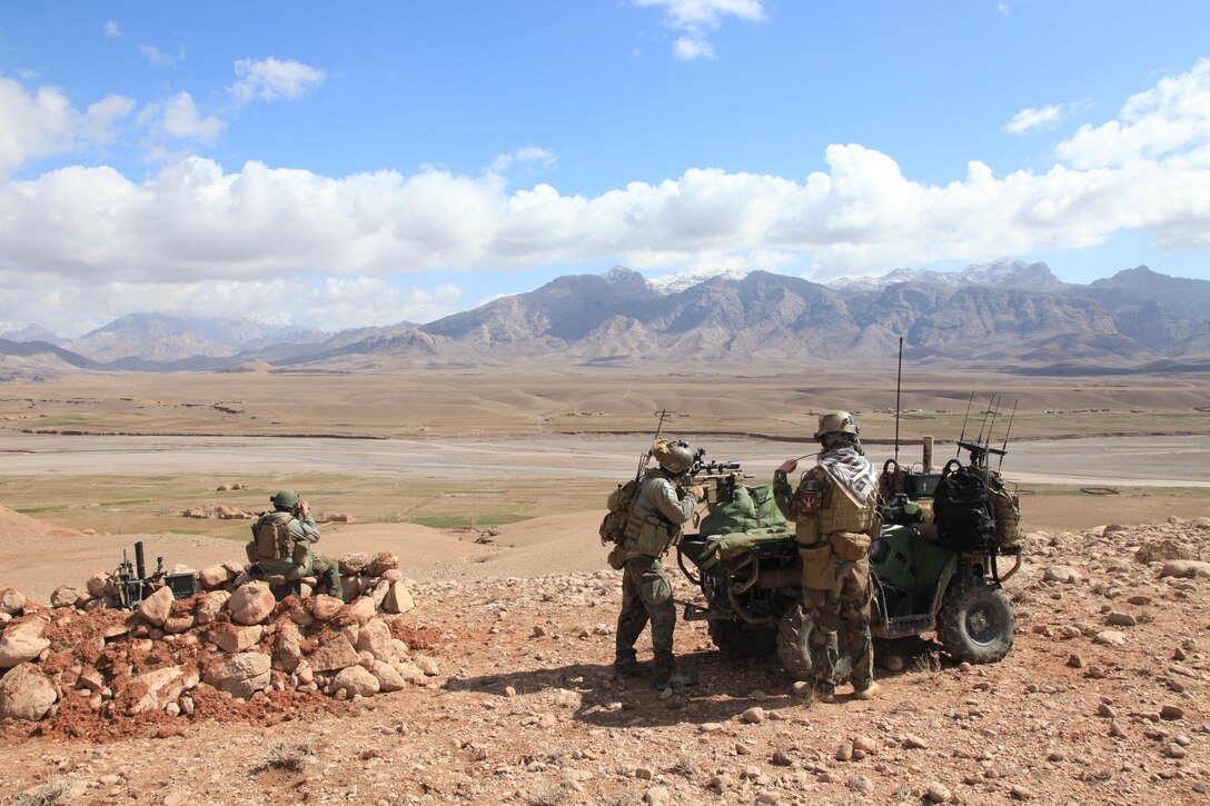 Marines with U.S. Marine Corps Forces, Special Operations Command provide security during a two-day presence patrol with Afghan Commandos in Farah province Feb. 27. Marines with MARSOC's 1st Marine Special Operations Battalion recently returned from a nine-month deployment to Afghanistan, where they commanded the Special Operations Task Force - West and oversaw one of Afghanistan's bloodiest regions. (U.S. Marine Corps photo by Cpl. Kyle McNally/Released)