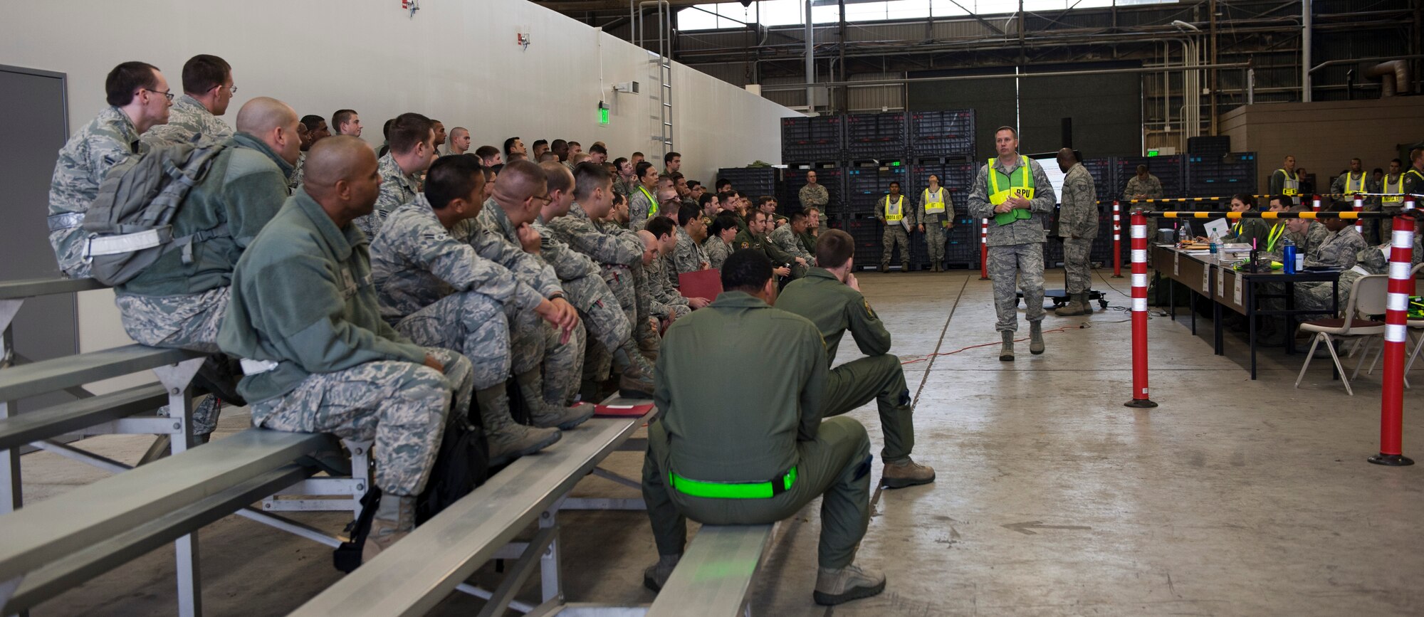 YOKOTA AIR BASE, Japan -- Airmen are given a brief for their simulated deployment to Yokota Air Base, Japan during an operational readiness exercise on Nov. 5, 2012. During the briefing Airmen receive information pertaining to the area where they will be stationed as well as legal advice. (U.S. Air Force photo by Airman 1st Class Krystal M. Garrett) 