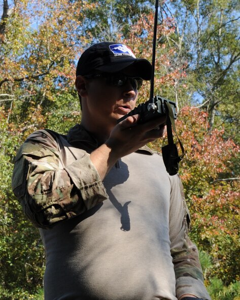 Staff Sgt. Charles Millison, 2nd Operation Support Squadron Survival, Evasion, Resistance and Escape operations NCO in charge, gives out a set of coordinates during the SERE Combat Survival Training on Barksdale Air Force Base, La., Nov. 1. The training was held to teach aircrew how to survive, evade capture and return safely in a combat situation. (U.S. Air Force photo/Senior Airman Sean Martin)(RELEASED)