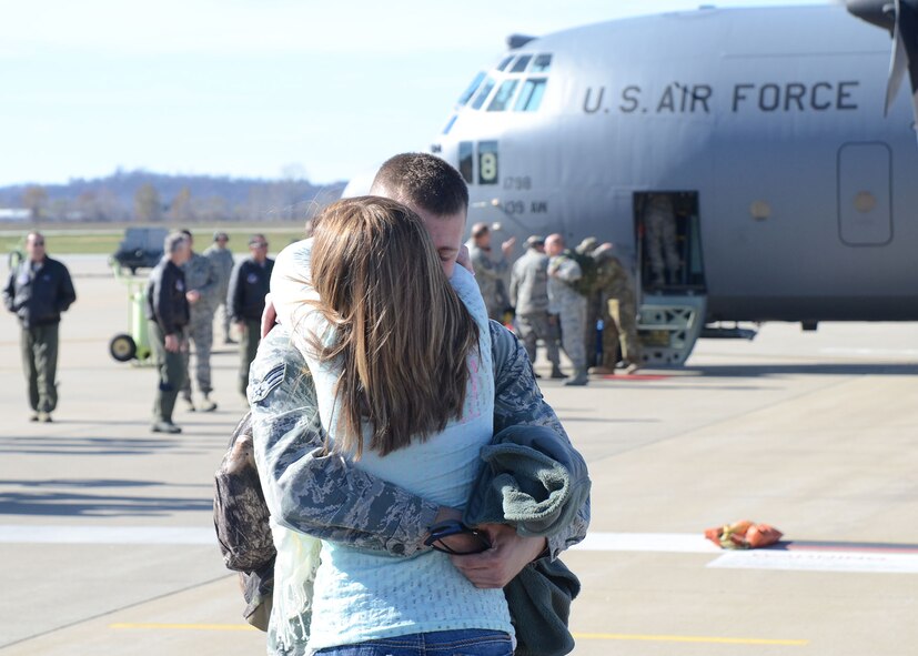 Family and friends of Missouri Air National Guard members at Rosecrans Air National Base, St. Joseph, Mo., Nov. 7 welcomed home nearly 50 deployed Airmen from overseas contingency operations in Southwest Asia. The citizen-Airmen with the 139th Airlift Wing left on Independence Day and returned just short of Veterans Day. (U.S. Air Force photo/Master Sgt. Mike R. Smith, 139th Airlift Wing) (Released)