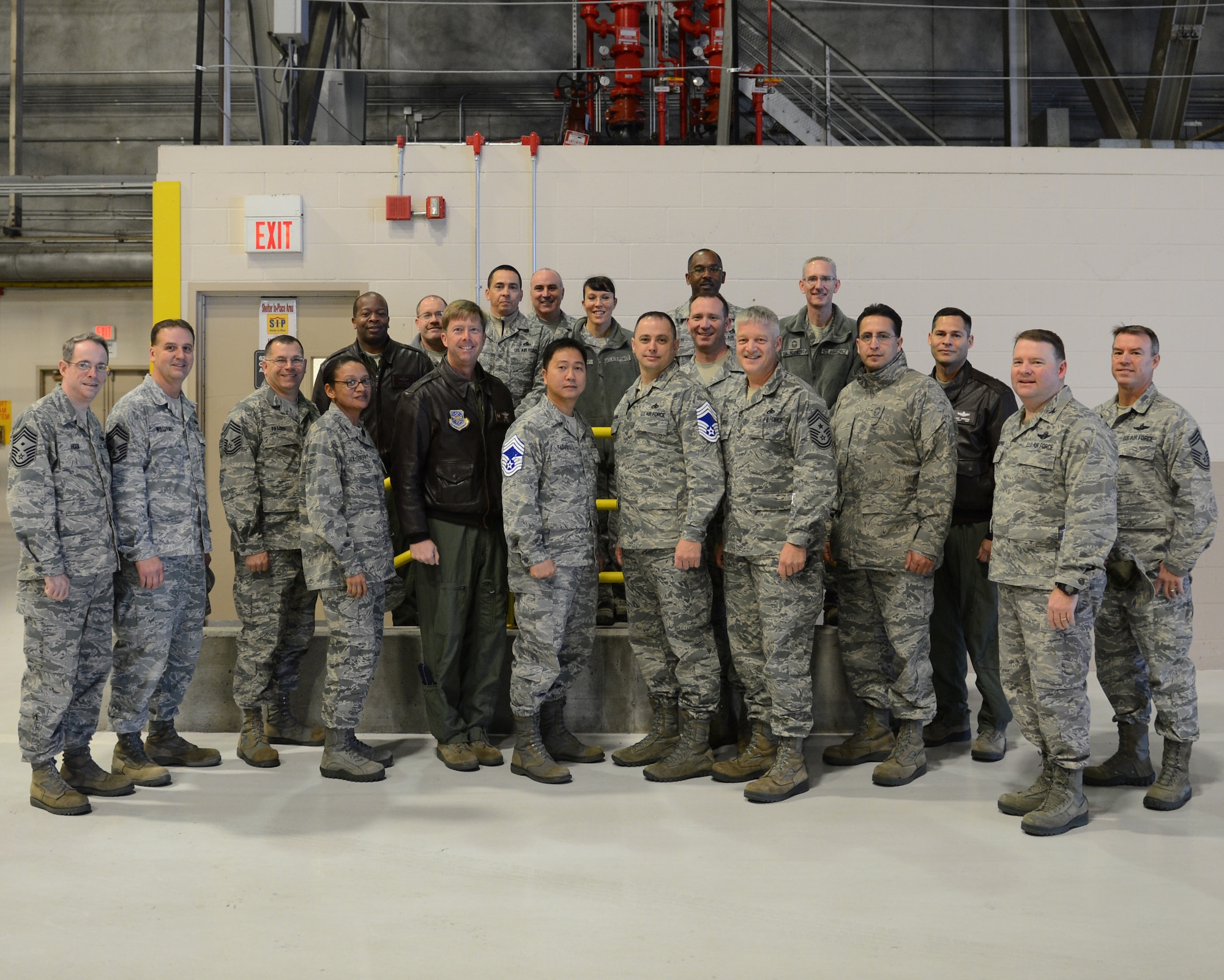 McChord Field leadership and 14 chief master sergeants surprise two of the three senior master sergeants selected for promotion to chief master sergeant, Nov. 8, 2012, at Joint Base Lewis-McChord, Wash. The three selected from the 62nd Airlift Wing were Senior Master Sgt. Armando Fajardo, 62nd Comptroller Squadron, Senior Master Sgt. Paul Harvell, 7th Airlift Squadron, and Senior Master Sgt. Richard Tallman, 62nd Maintenance Group. (U.S. Air Force photo/Staff Sgt. Frances Kriss)