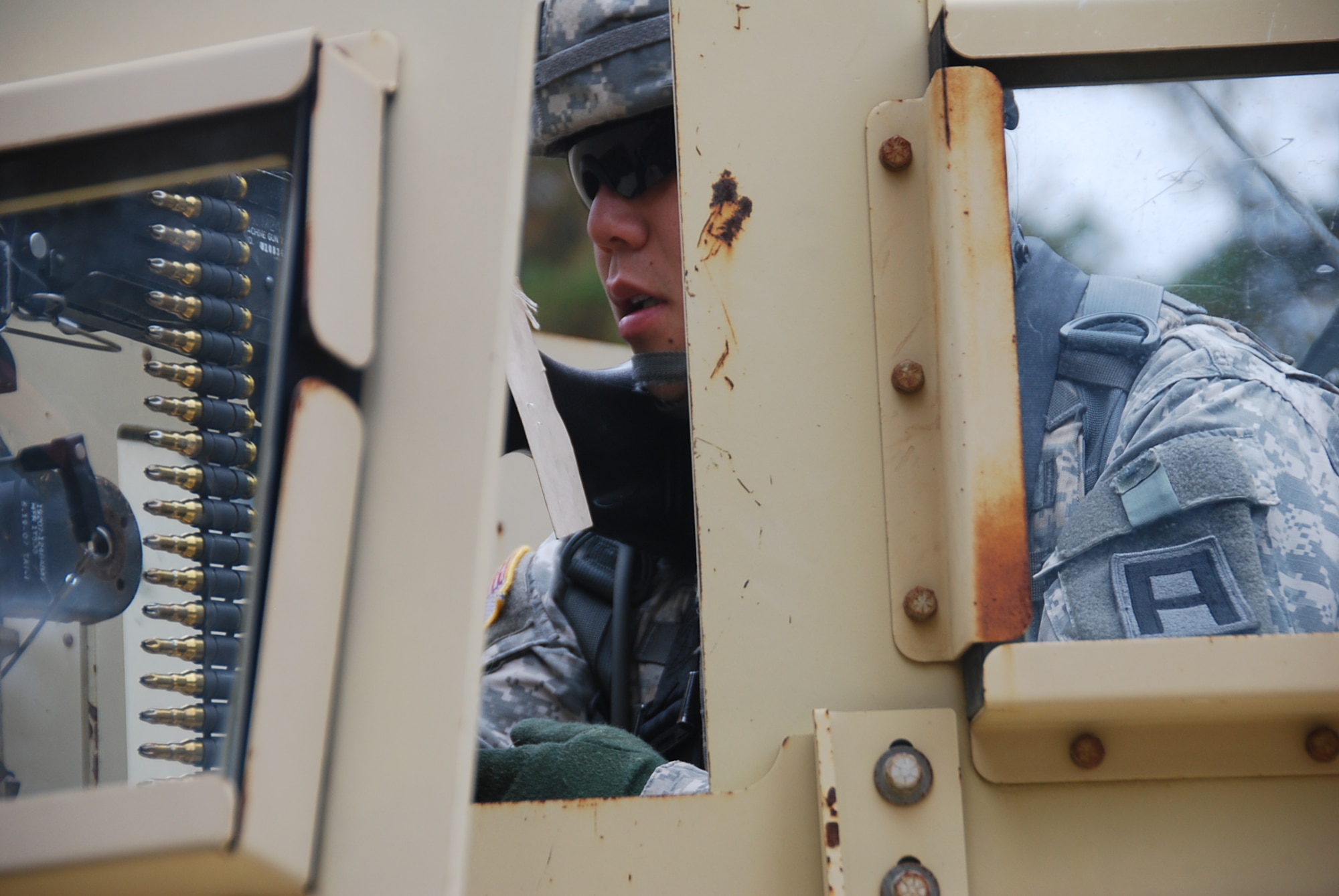 Capt. Houng Lee, Trainer/Mentor with 2nd Battalion, 309th Regiment, serves as gunner during a hasty checkpoint mission, part of the First Army Training Academy Observer Controller /Trainer course at Joint Base McGuire-Dix-Lakehurst. N.J. Lee and more than 100 fellow Soldiers graduated from the First Army Training Academy recently and now support the 174th Infantry Brigade’s enduring training mission of mobilizing, training and deploying Reserve Component Service Members for deployments around the world.