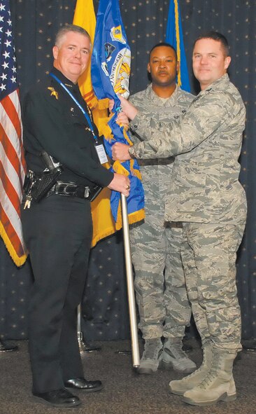 KIRTLAND AFB, N.M. – Team Kirtland held its annual Honorary Commanders Assumption of Command Ceremony Nov. 1 at the Mountain View Club. Col. Paul Barney, 377th Security Forces Group commander, right, and Ray Schultz, Albuquerque Police Department chief. (Photo by Ken Moore)