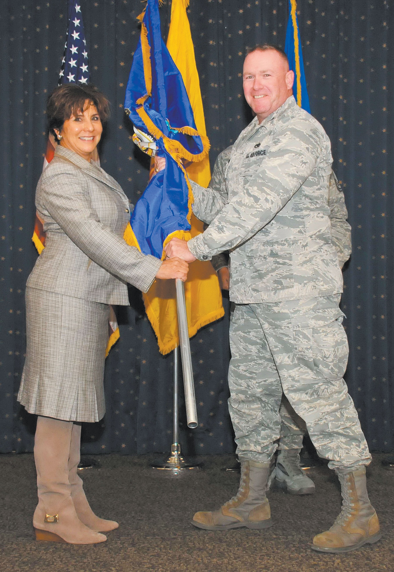KIRTLAND AFB, N.M. – Team Kirtland held its annual Honorary Commanders Assumption of Command Ceremony Nov. 1 at the Mountain View Club. Col. Thomas Ventriglia, 377th Maintenance Group commander, right, and Patricia Knighten, Prescient 360 owner. (Photo by Ken Moore)
