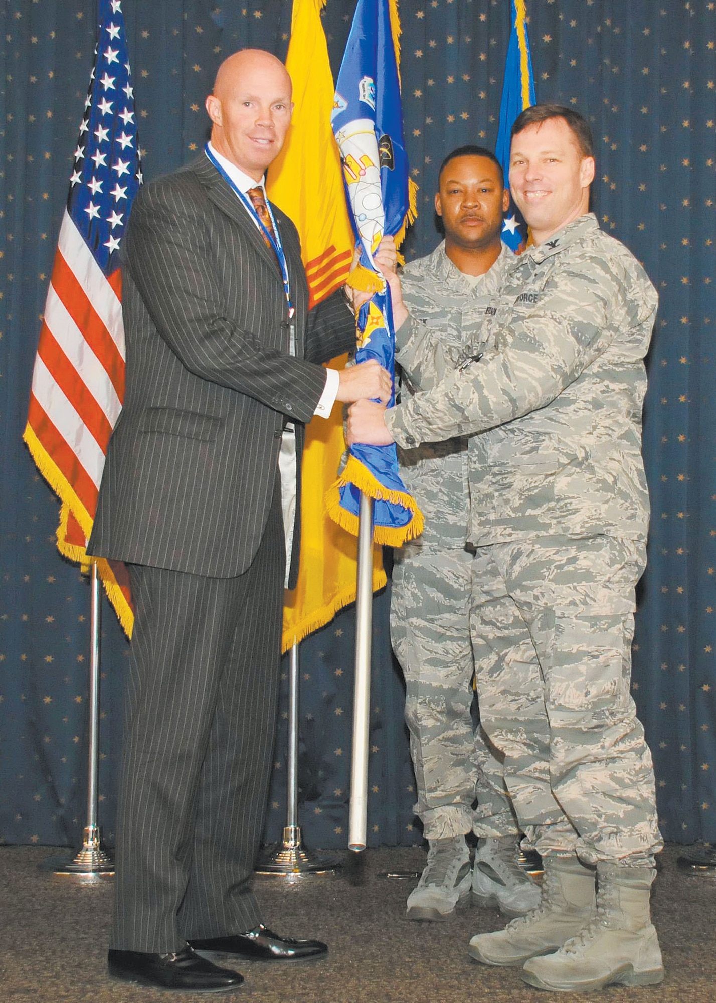 KIRTLAND AFB, N.M. – Team Kirtland held its annual Honorary Commanders Assumption of Command Ceremony Nov. 1 at the Mountain View Club. Col. Dagvin Anderson, 58th Operations Group commander, right, and John Murphy, Enterprise Holdings vice president and general manager. (Photo by Ken Moore)
