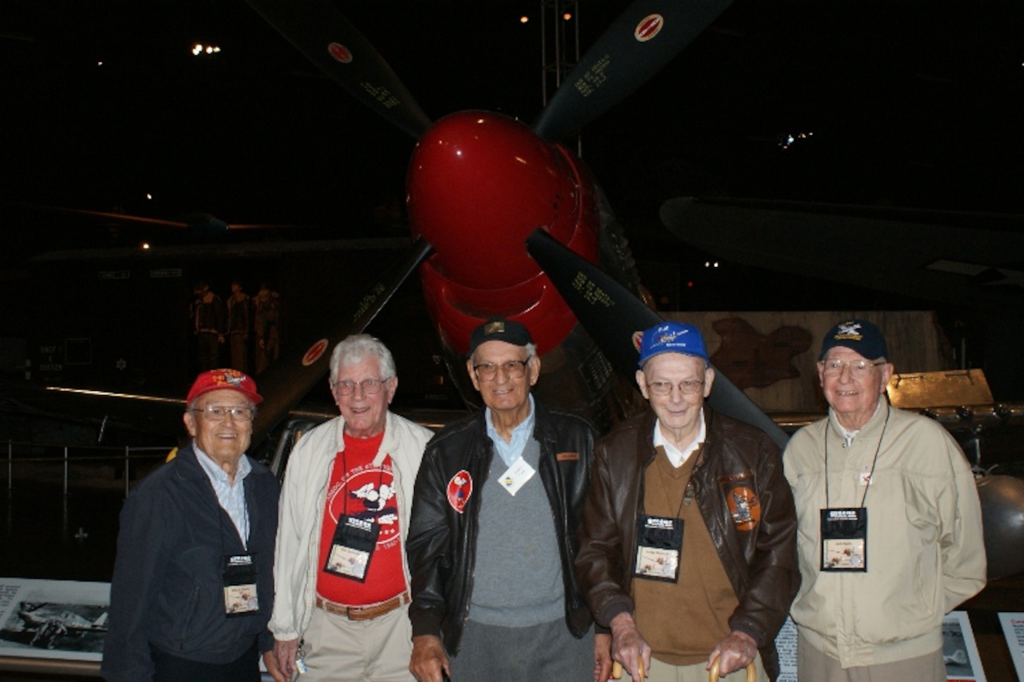 Former members of the 4th Fighter Group pose for a photo while celebrating the 70th Anniversary of Group's activation at the Museum of the U.S. Air Force at Wright-Patterson Air Force Base, Ohio, Sept. 29. Featured in the photo from left to right are Willard "G.I." Gillette, Don Groomer, Andy Lacy, Richard Rinebolt and Jack Swan. (Photo courtesy of Mark Richie)