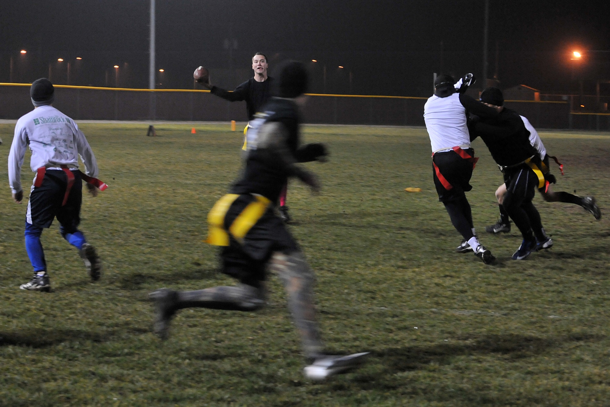 U.S. Air Force Staff Sgt. Ryan Wenthur, with the 55th Intelligence Support Squadron, throws a football down the field during the intramural flag football game between 55th ISS and U.S. Strategic Command on Offutt Air Force Base, Neb., Nov. 5. The 55th ISS is the hub for 55th Wing intelligence oversight and intelligence, surveillance and reconnaissance management, as well as the worldwide maintenance hub for mission equipment on all RC-135 variants. (U.S. Air Force photo by Charles Haymond/Released)