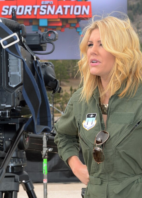 Charissa Thompson speaks with Mountain West Conference reporters during the lead-in to ESPN's SportsNation broadcast at the Air Force Academy Nov. 8, 2012. Thompson and Colin Cowherd host the show, which broadcast a special Veterans Day tribute Nov. 8. SportsNation broadcasts weekdays at 4 p.m. Mountain Time on ESPN2. (U.S. Air Force photo/Don Branum)